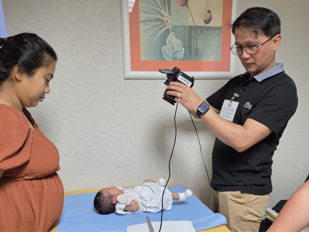 Taking passport photos of newborns is a delicate job — the Embassy’s consular team does it with care, patience, and gentleness.